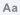 A small gray button which looks like an upper-case A next to a lower-case a.