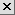 A small gray button with a black x in the center.