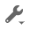 A gray wrench icon on a white background.