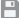 A small gray button which looks like a floppy disk.